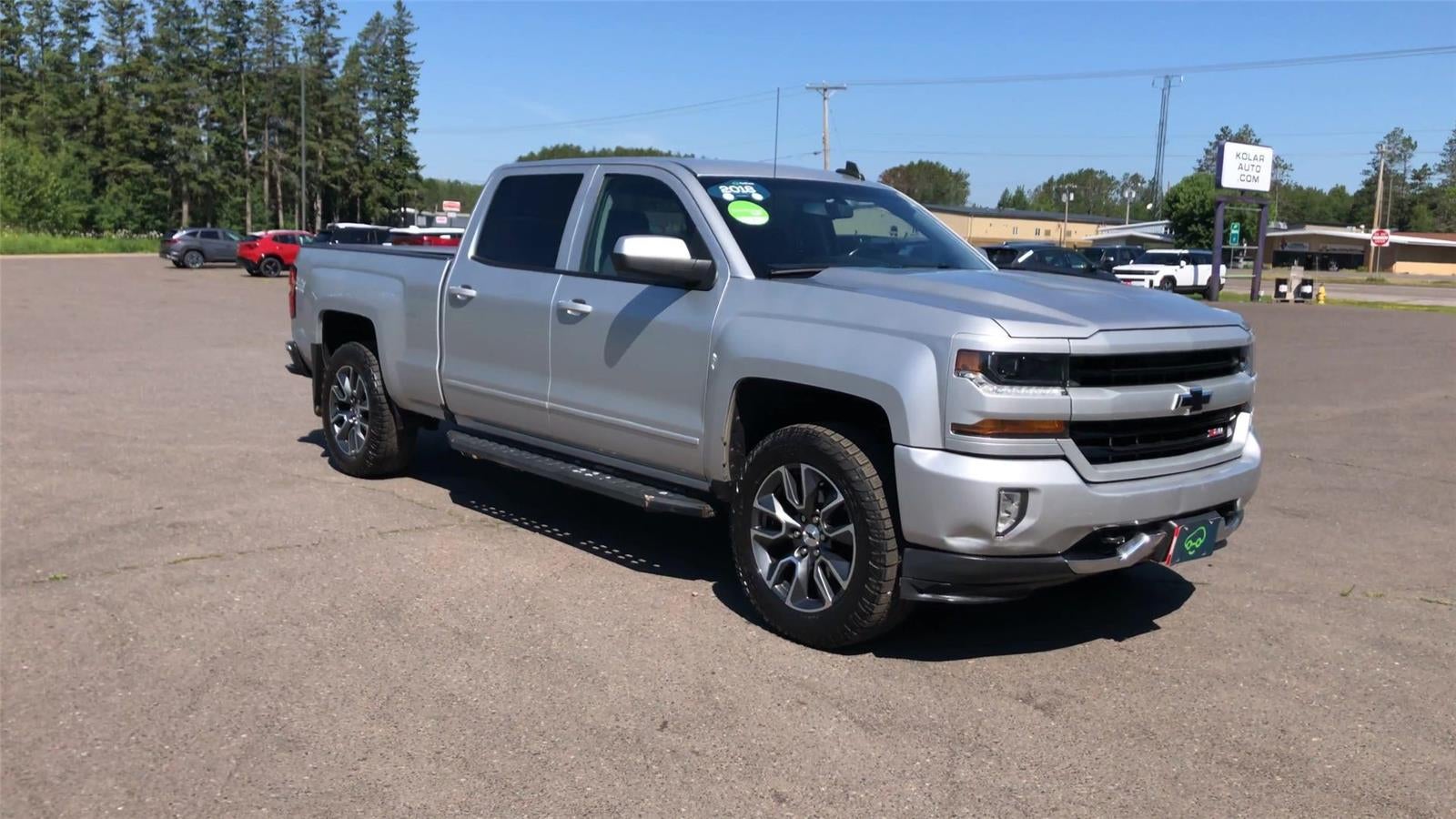 Used 2018 Chevrolet Silverado 1500 LT with VIN 3GCUKREC4JG449083 for sale in Hermantown, Minnesota