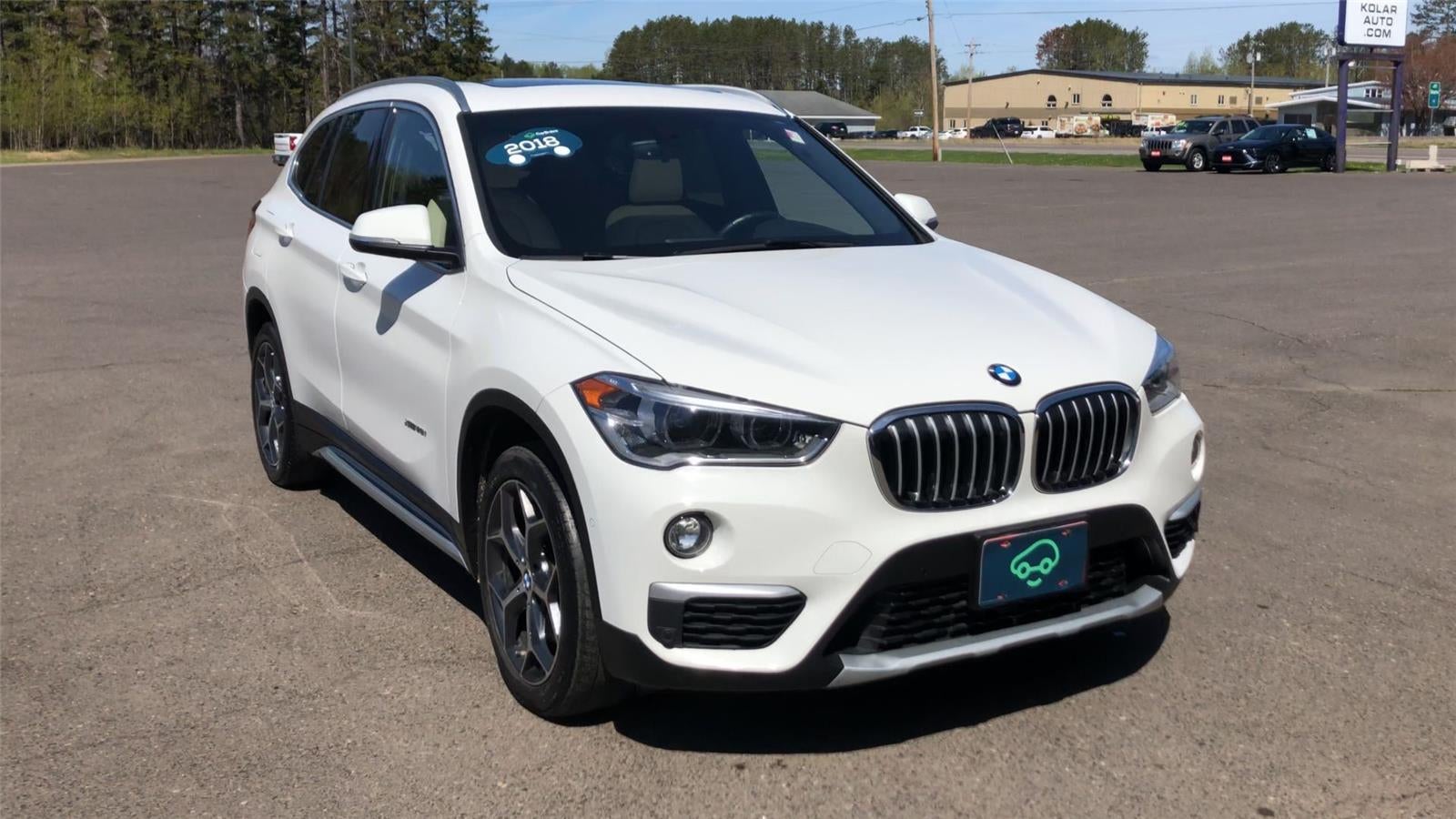 Used 2018 BMW X1 28i with VIN WBXHT3C39J5K28135 for sale in Hermantown, Minnesota